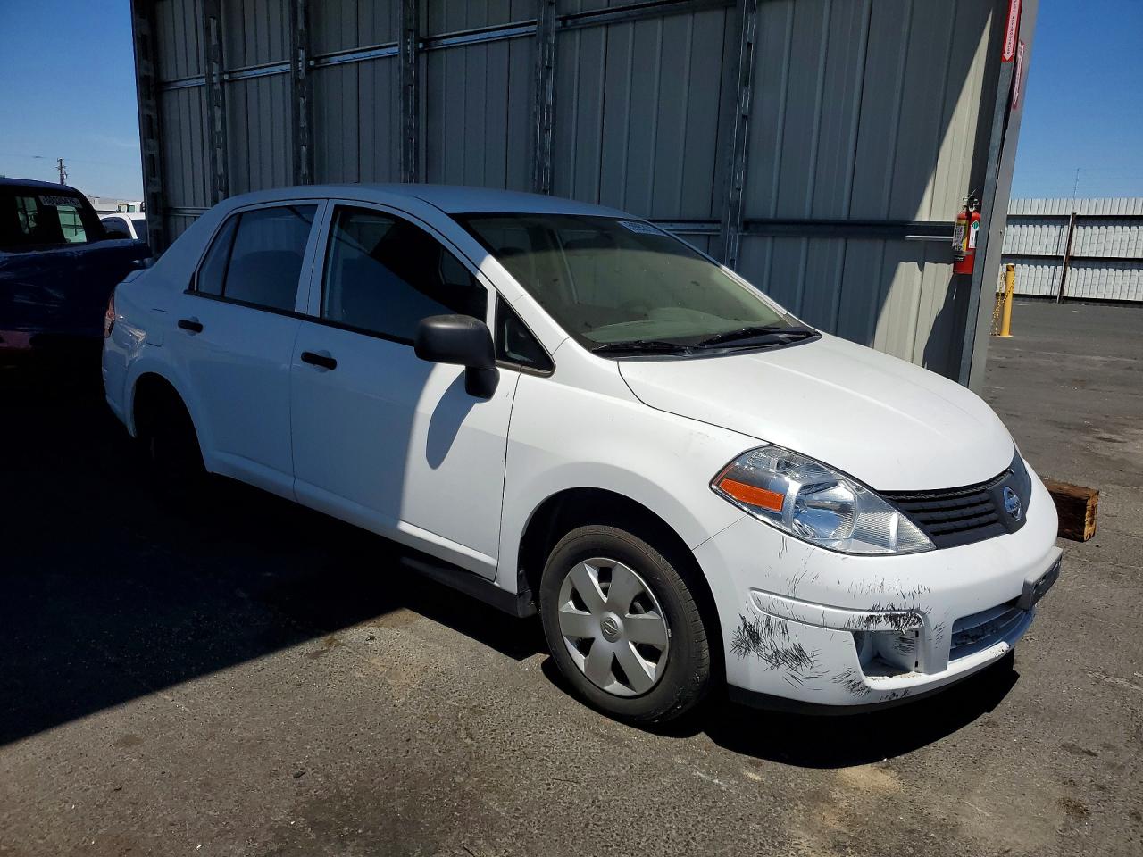 2009 Nissan Versa 1.6 Base White vin: 3N1CC11E99L436627