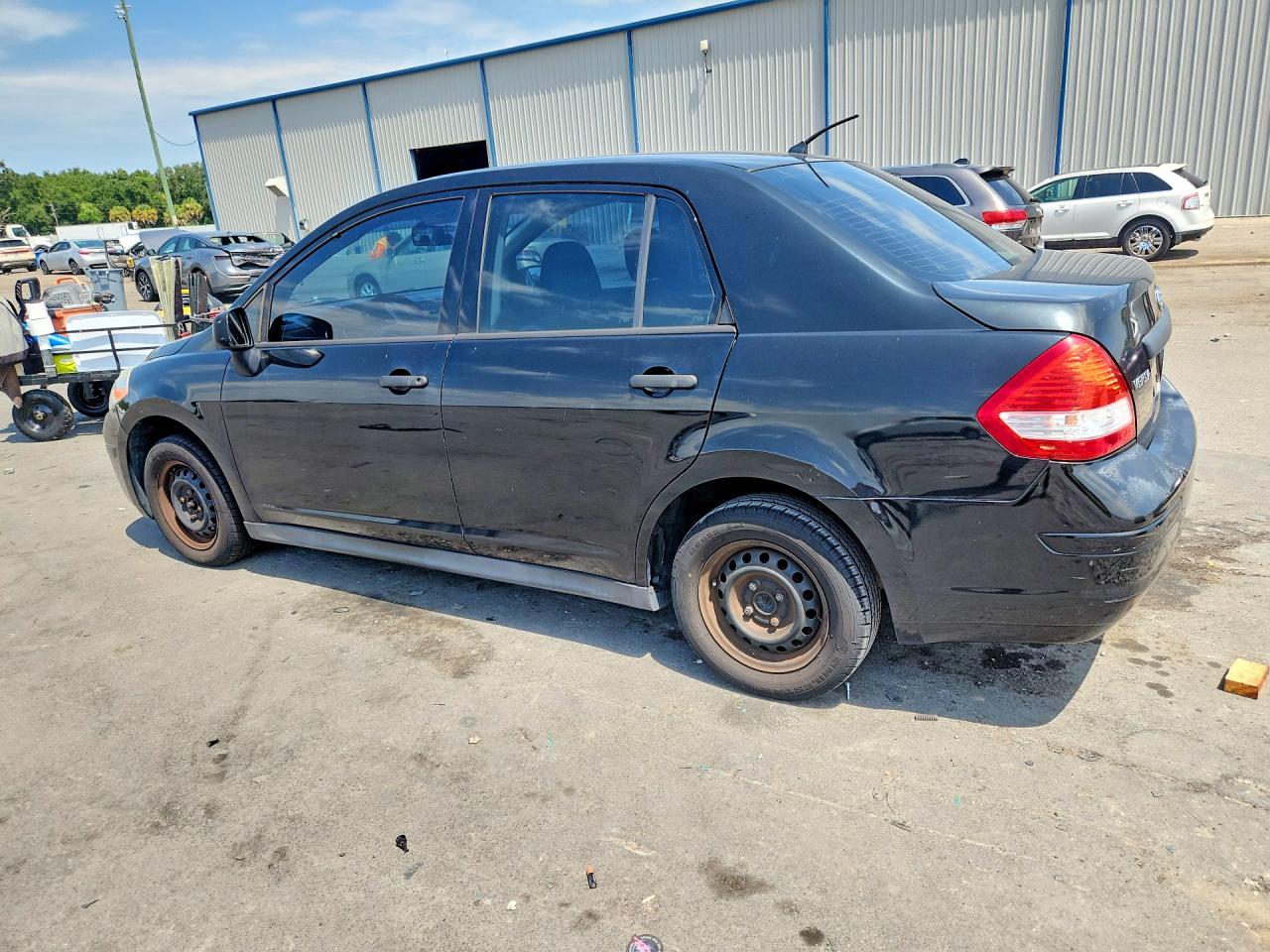 2011 Nissan Versa 1.6 Base Black vin: 3N1CC1AP3BL371622