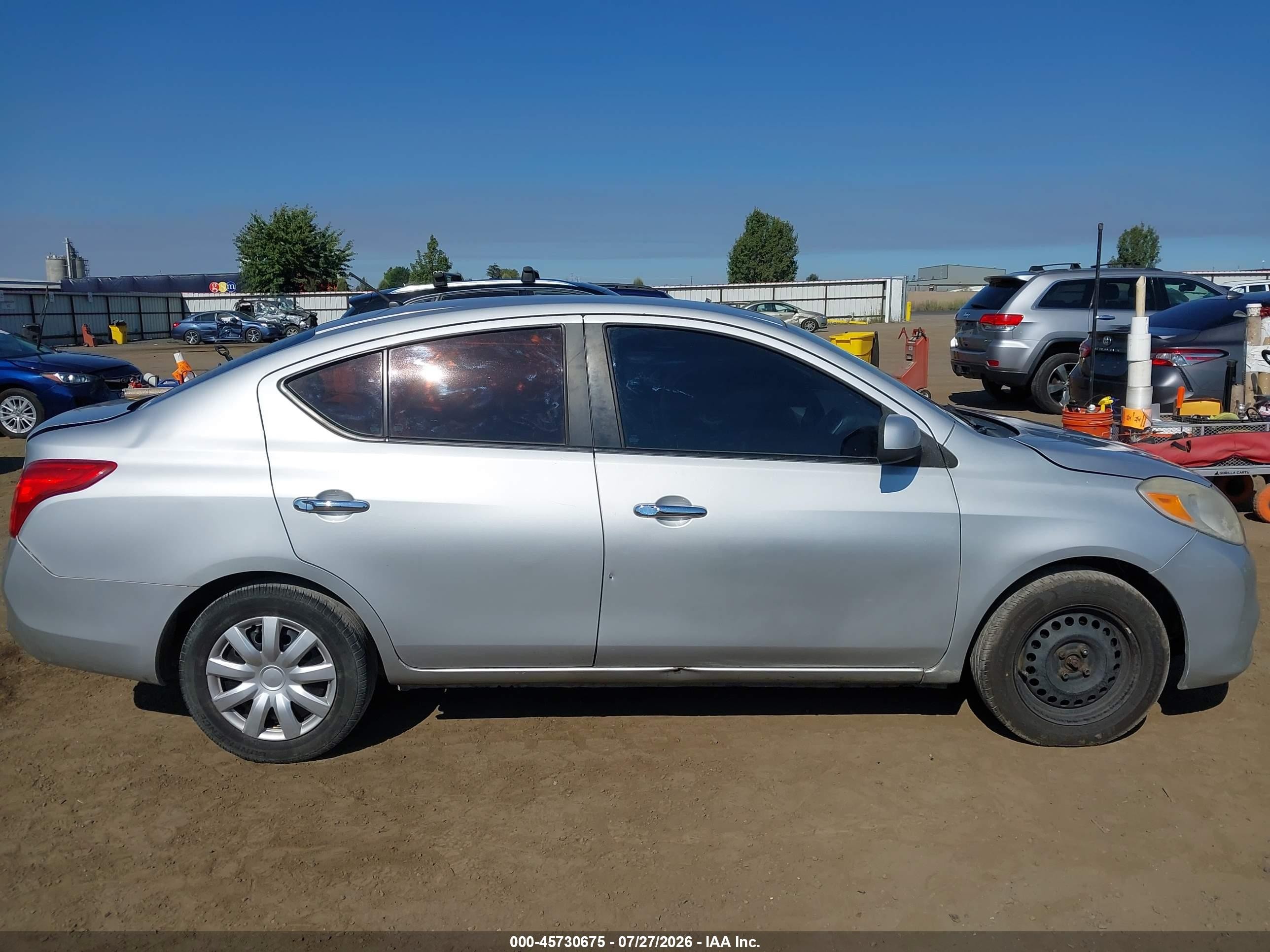 2012 Nissan Versa 1.6 Sv Серебряный vin: 3N1CN7AP0CL826571