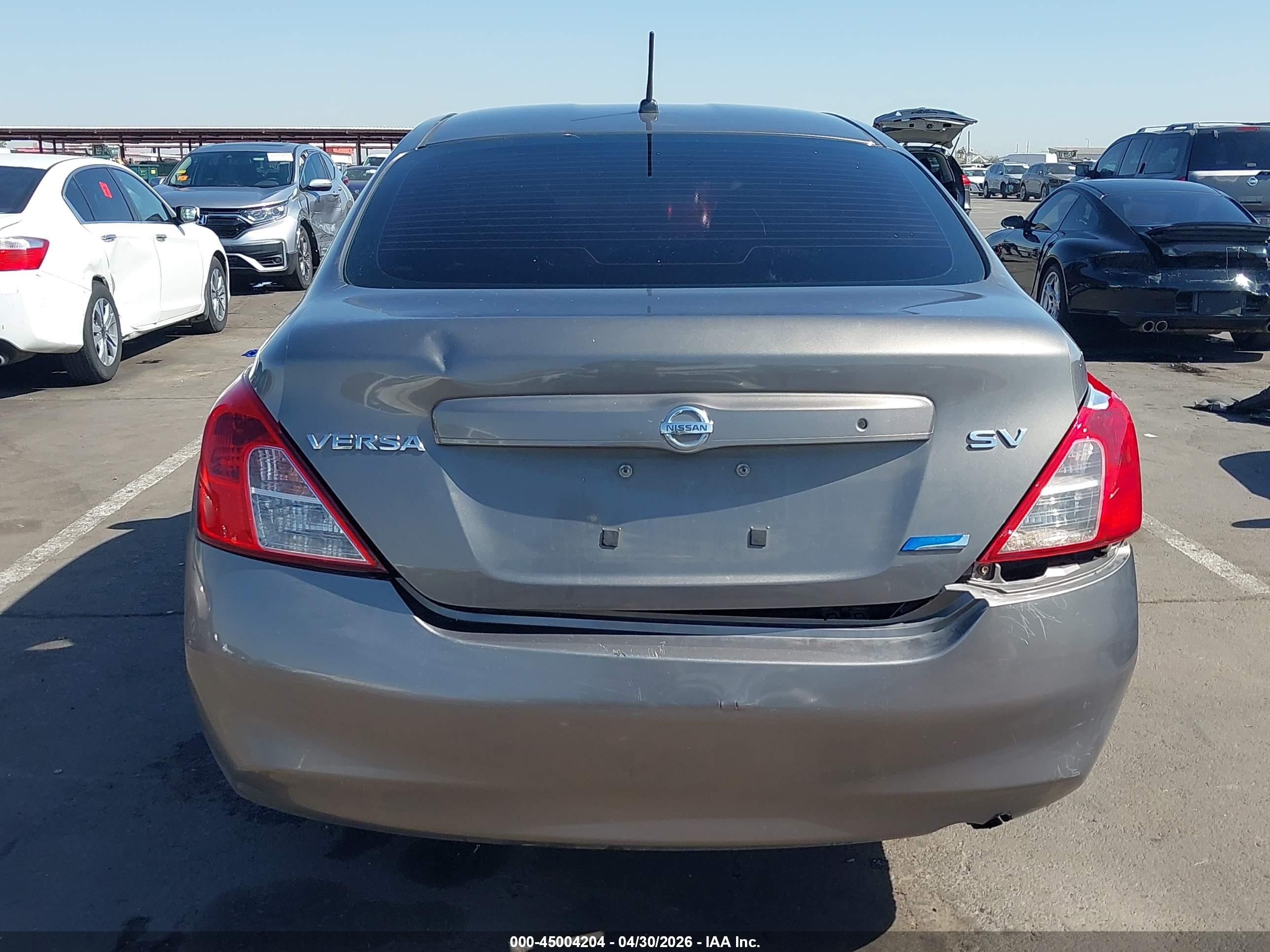 2012 Nissan Versa 1.6 Sv Серый vin: 3N1CN7AP2CL814535