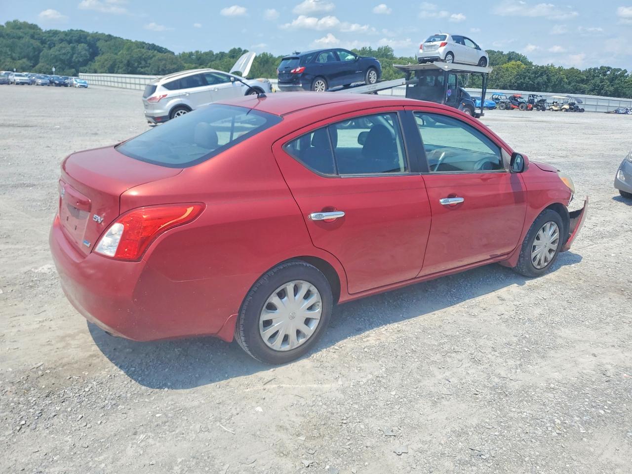 2012 Nissan Versa 1.6 S Red vin: 3N1CN7AP2CL846630
