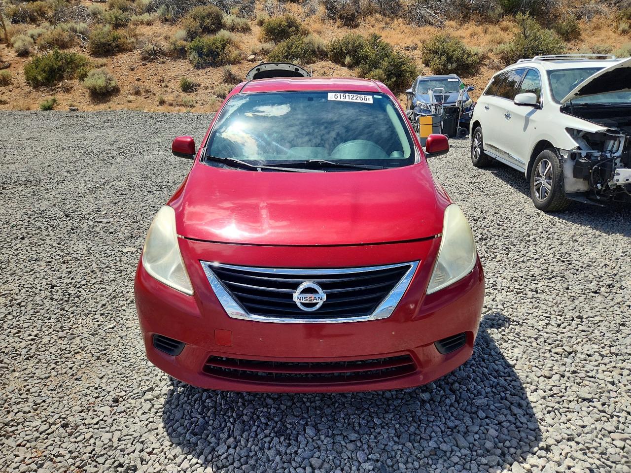 2012 Nissan Versa 1.6 S Red vin: 3N1CN7AP2CL927546