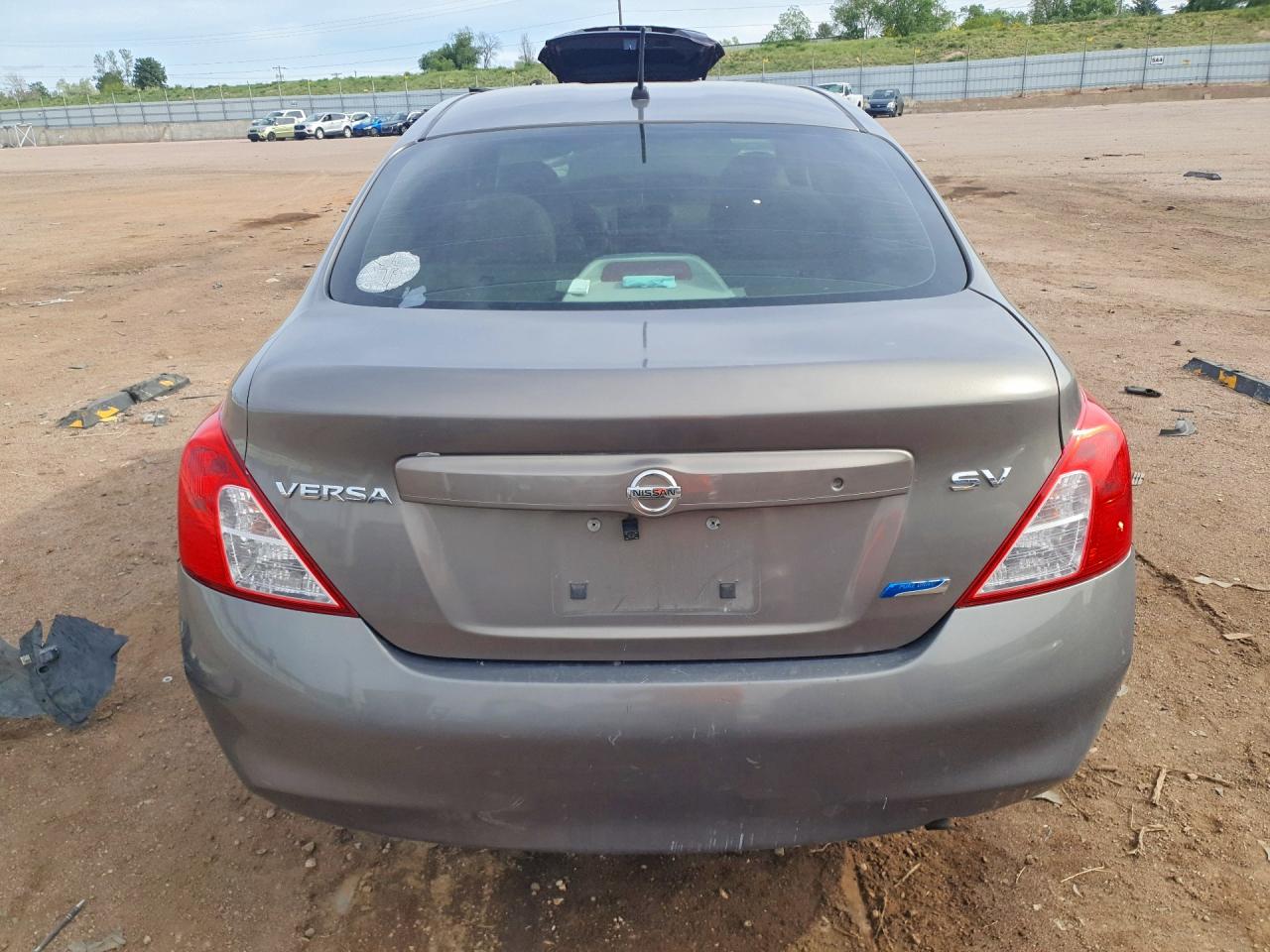 2012 Nissan Versa 1.6 S Tan vin: 3N1CN7AP2CL945738
