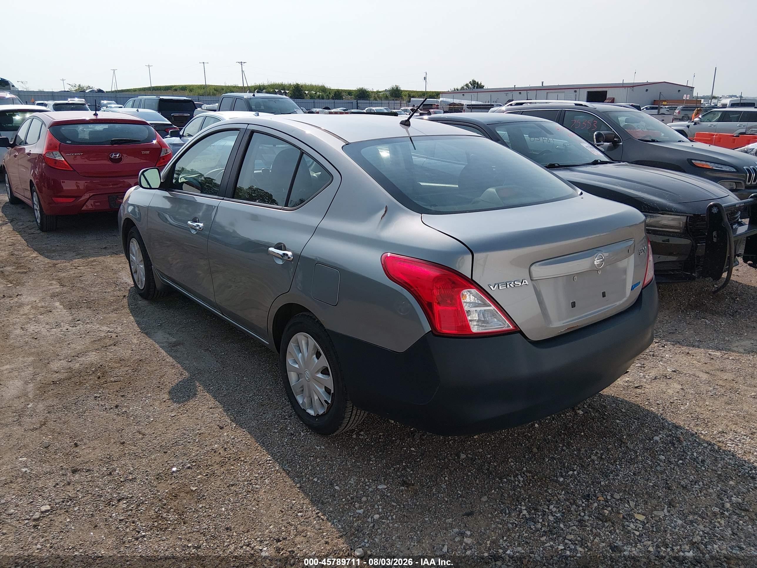 2012 Nissan Versa 1.6 Sv Silver vin: 3N1CN7AP5CL888144