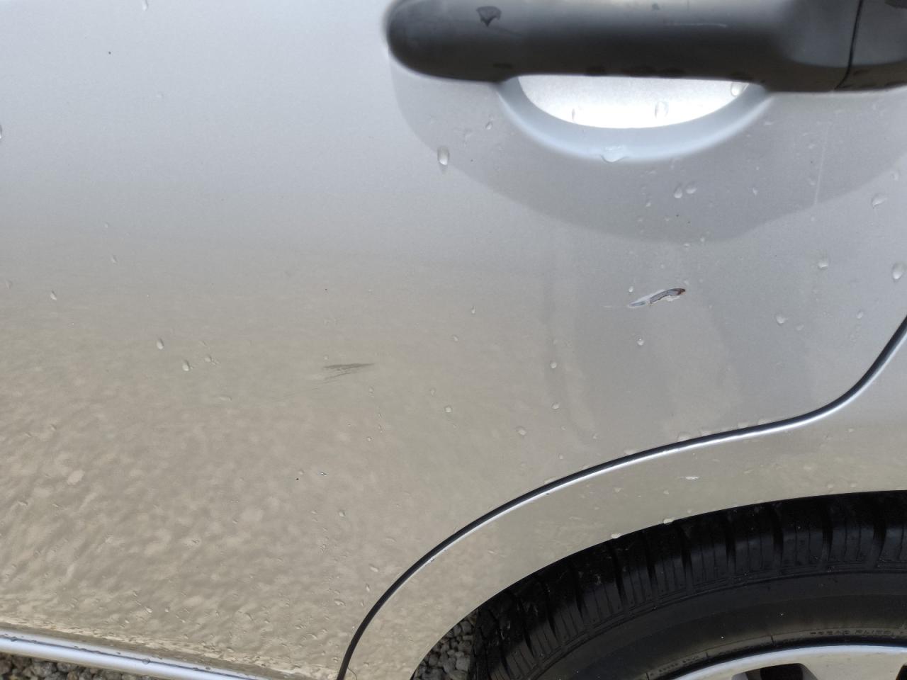 2012 Nissan Versa 1.6 S Silver vin: 3N1CN7AP6CL938047 Damage: Left Rear Door, Heavy Scratch, 1 To 2 Inches