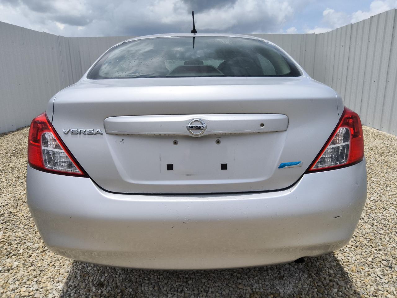 2012 Nissan Versa 1.6 S Silver vin: 3N1CN7AP6CL938047 Damage: Rear Bumper/Cover, Scraped, 3 To 4 Inches