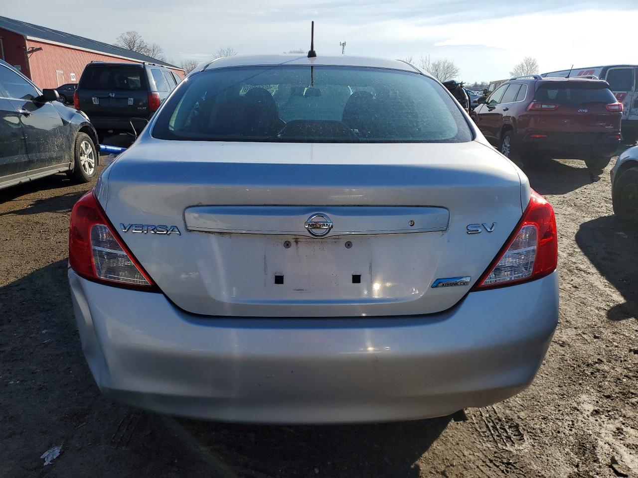 2012 Nissan Versa 1.6 S Серебряный vin: 3N1CN7AP7CL800615