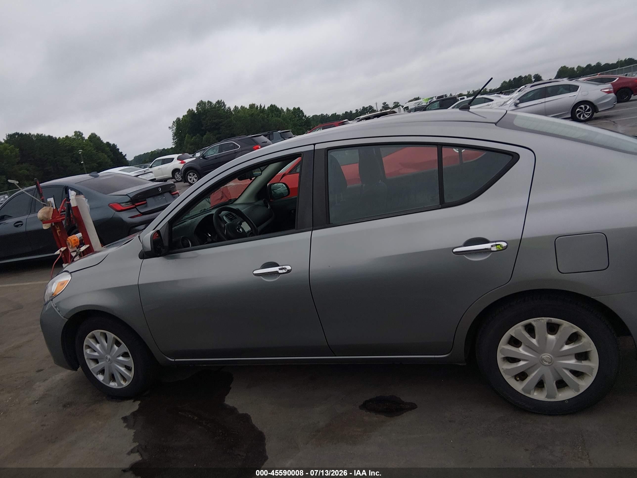 2012 Nissan Versa 1.6 Sv Silver vin: 3N1CN7AP7CL844131