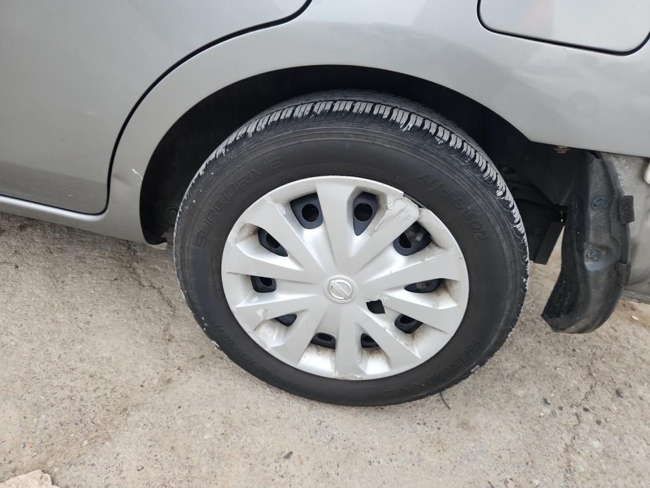 2012 Nissan Versa 1.6 S Белый vin: 3N1CN7AP7CL861642 Damage: Left Rear Wheel Cover, Broken, Replacement Required