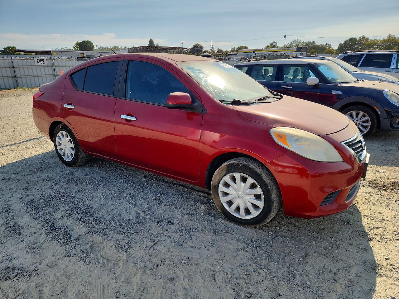 2012 Nissan Versa 1.6 S Red vin: 3N1CN7AP7CL907809