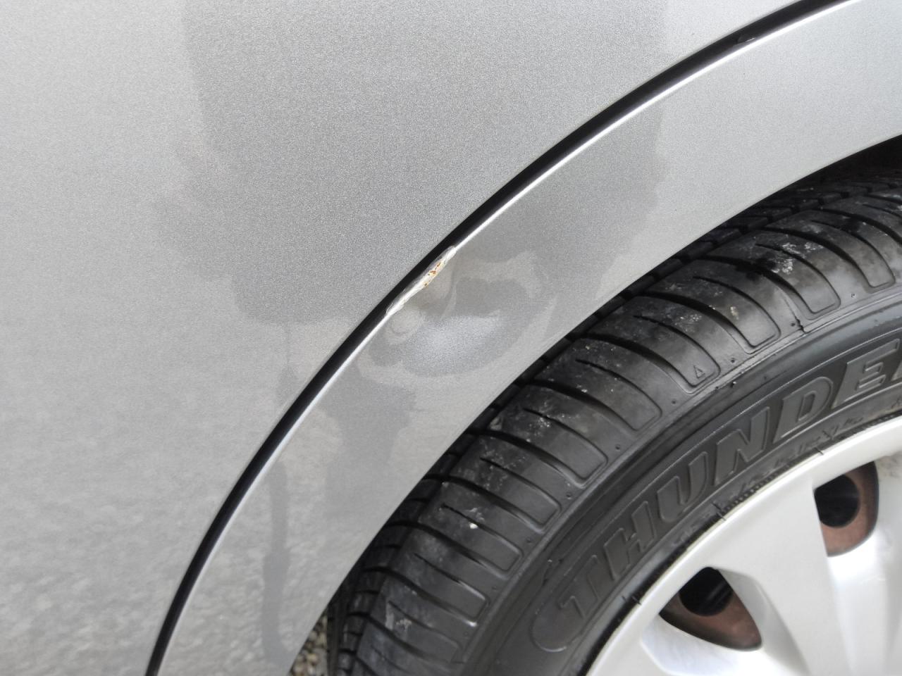 2014 Nissan Versa 1.6 S Silver vin: 3N1CN7APXEL829237 Damage: Left Qtr Panel, Dent(S) W/ Paint Dmg, 2 To 3 Inches