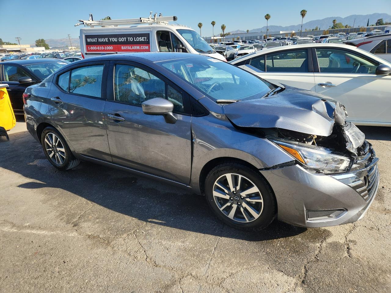 2025 Nissan Versa Sv Gray vin: 3N1CN8EV2SL826567 Damage: Right Head Lamp, Broken, Replacement Required