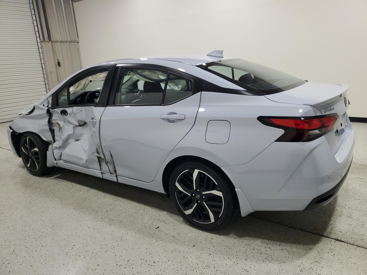 2025 Nissan Versa Sr Blue vin: 3N1CN8FV4SL832644 Damage: Left Rear Door, Dent(S) W/ Paint Dmg, > 12 Inches