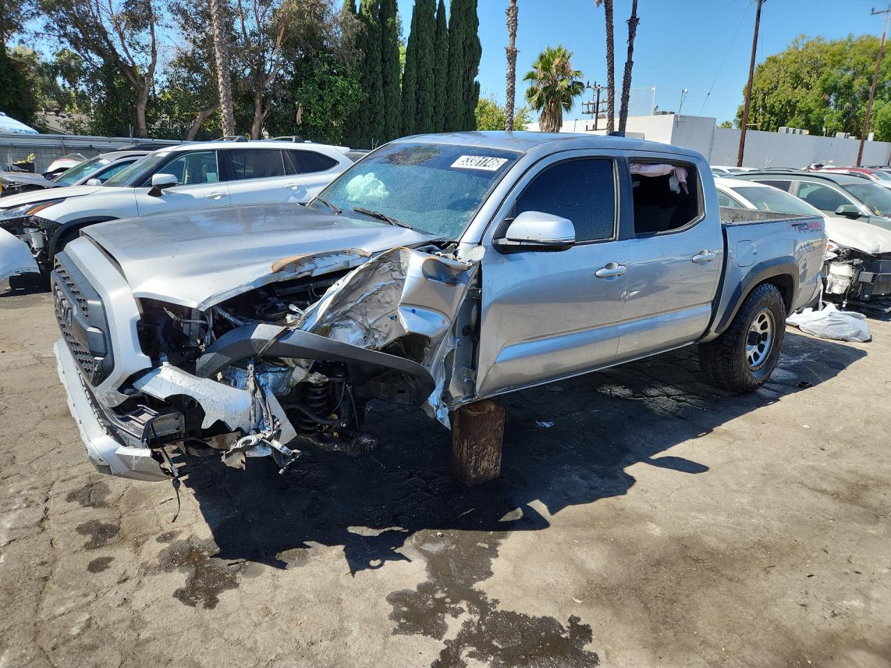 2023 Toyota Tacoma Trd Off-road Tan vin: 3TMCZ5AN1PM607011 Damage: Left Apron, Bent, > 12 Inches
