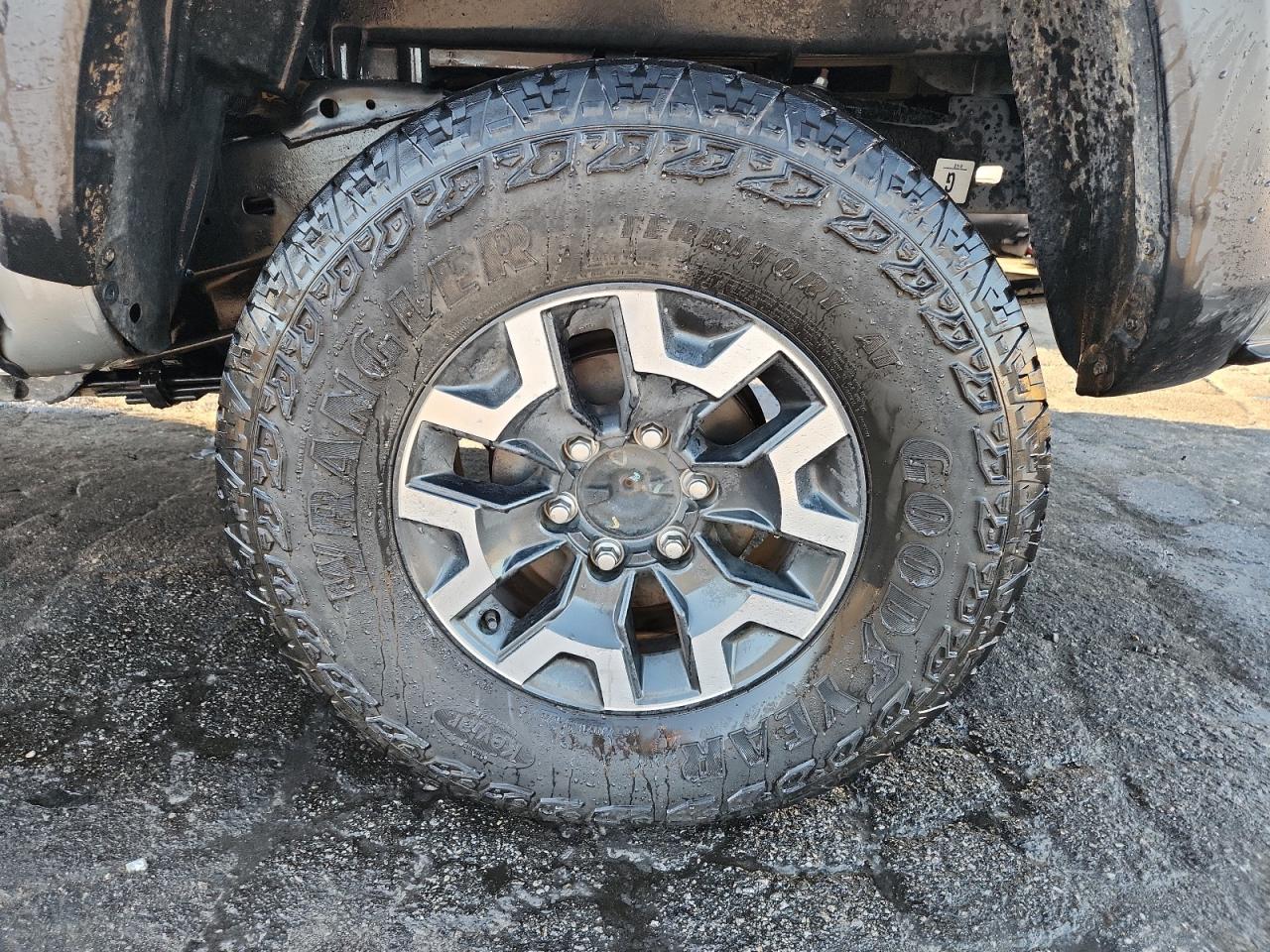 2023 Toyota Tacoma Trd Off-road Silver vin: 3TMCZ5AN4PM583870 Damage: Left Rear Center Cap, Missing, Replacement Required
