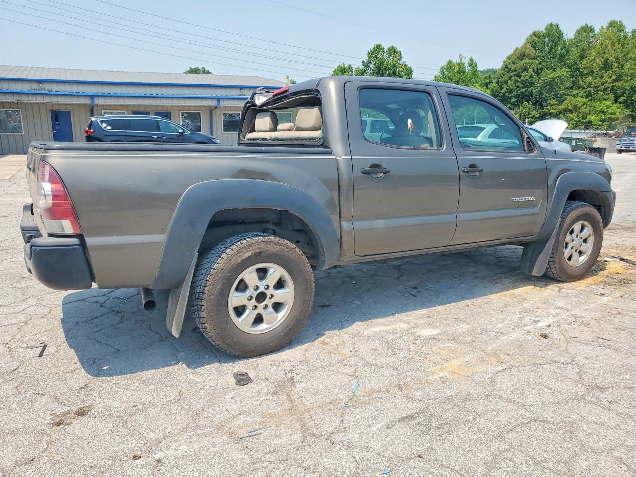 2009 Toyota Tacoma Double Cab Prerunner Tan vin: 3TMJU62N89M081747