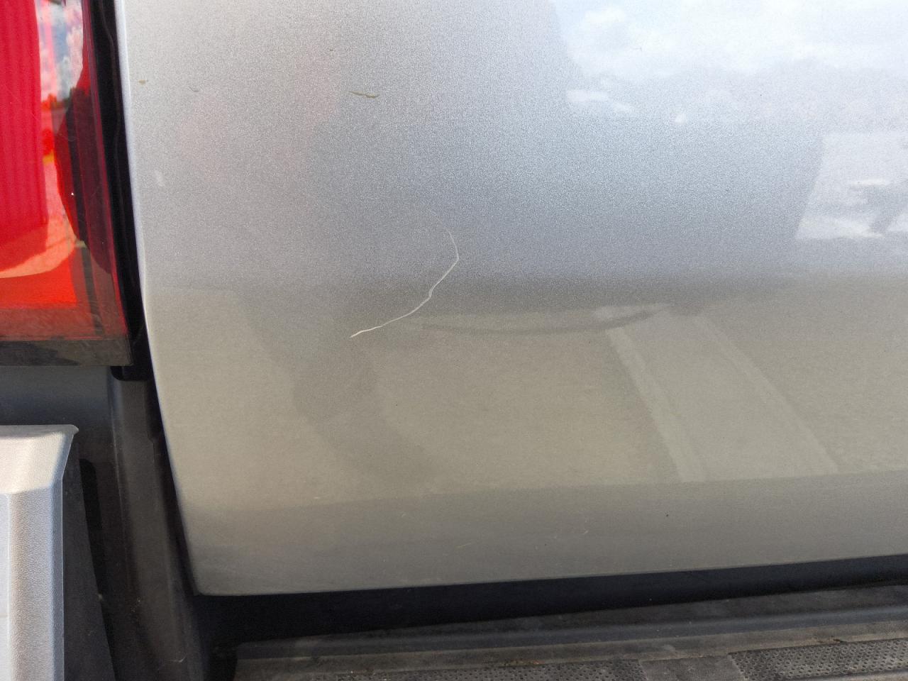 2025 Toyota Tacoma Sr5 Silver vin: 3TMKB5FNXSM031114 Damage: Deck Lid, Light Scratch, 2 To 3 Inches