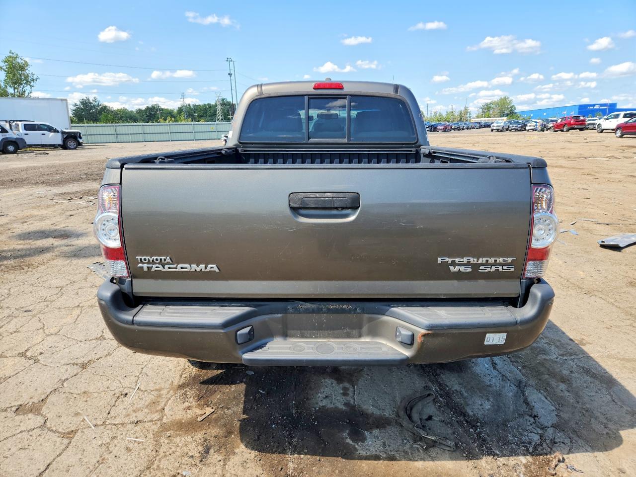 2010 Toyota Tacoma Double Cab Prerunner Long Bed Tan vin: 3TMKU4HN6AM025827
