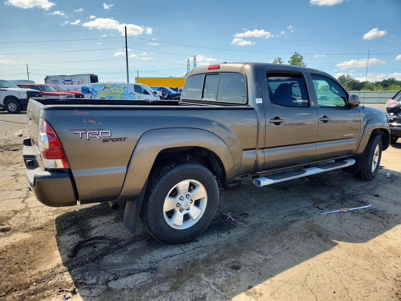 2010 Toyota Tacoma Double Cab Prerunner Long Bed Tan vin: 3TMKU4HN6AM025827