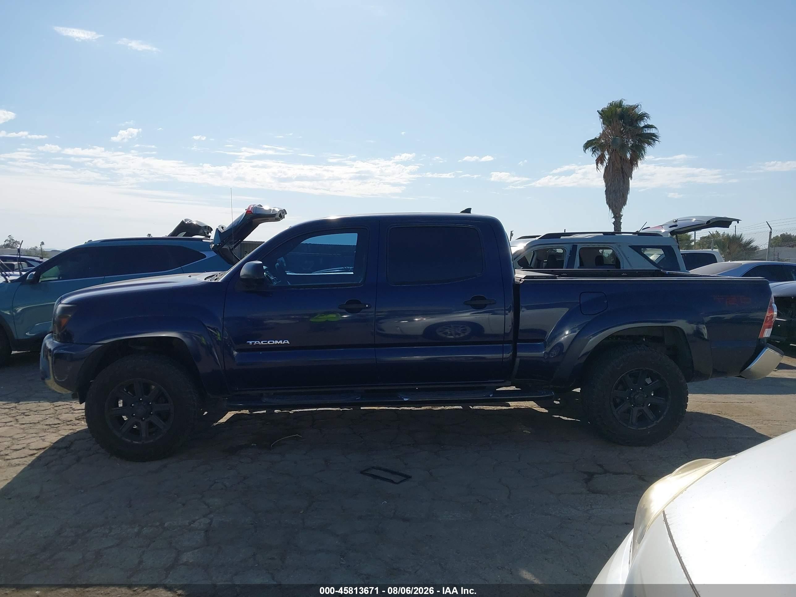 2012 Toyota Tacoma Prerunner V6 Dark Blue vin: 3TMKU4HN8CM032166
