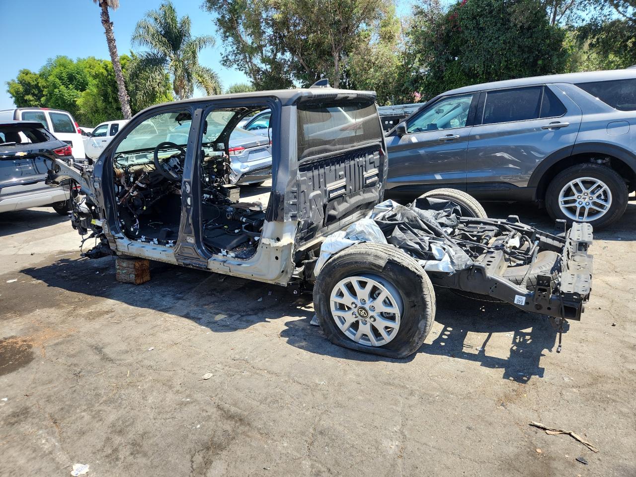 2025 Toyota Tacoma Trd Off-road Black vin: 3TMLB5JN2SM167734 Damage: Left Rear Tire, Cut, Replacement Required