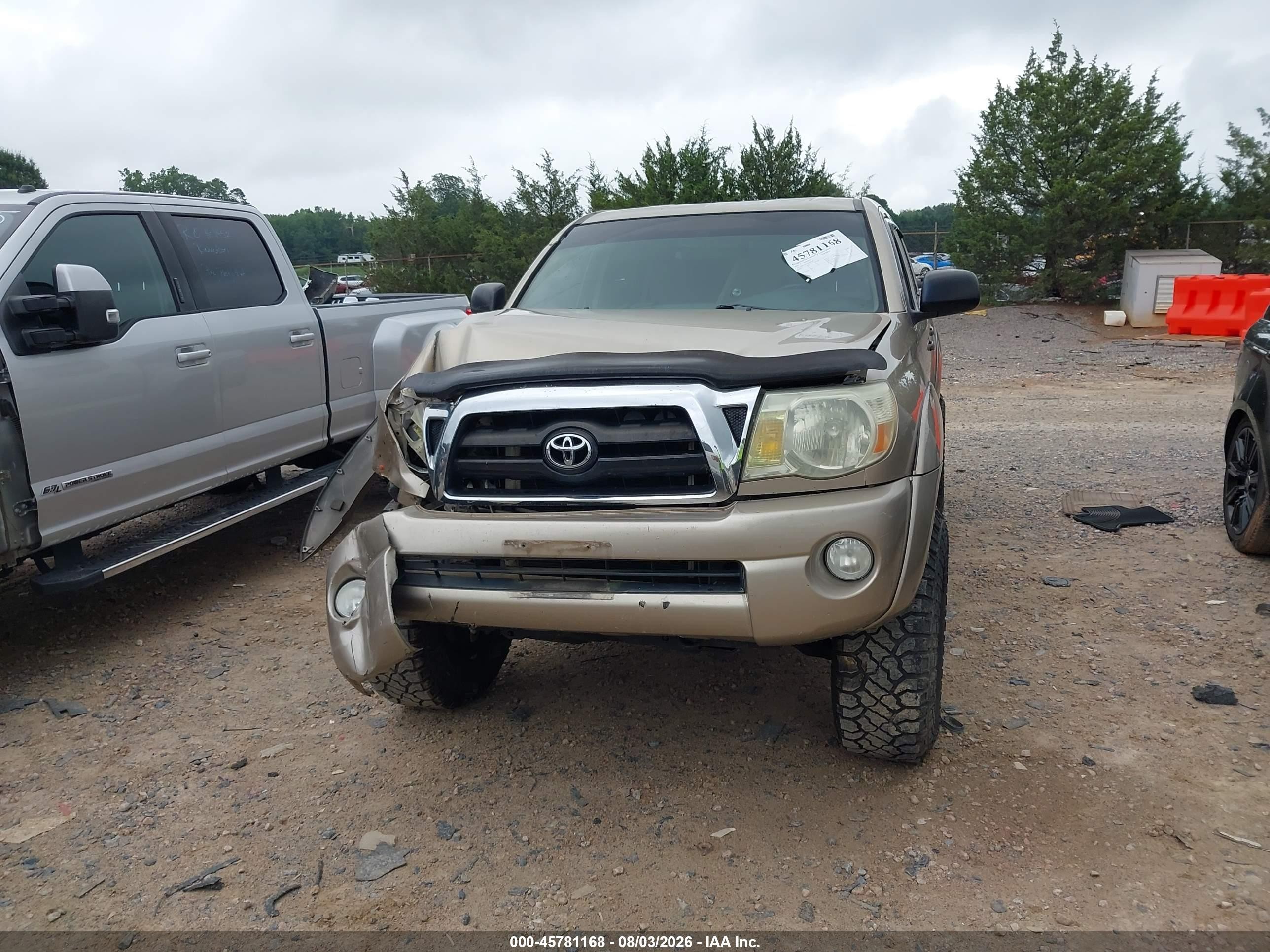 2005 Toyota Tacoma Base V6 Золотой vin: 3TMLU42N95M002786