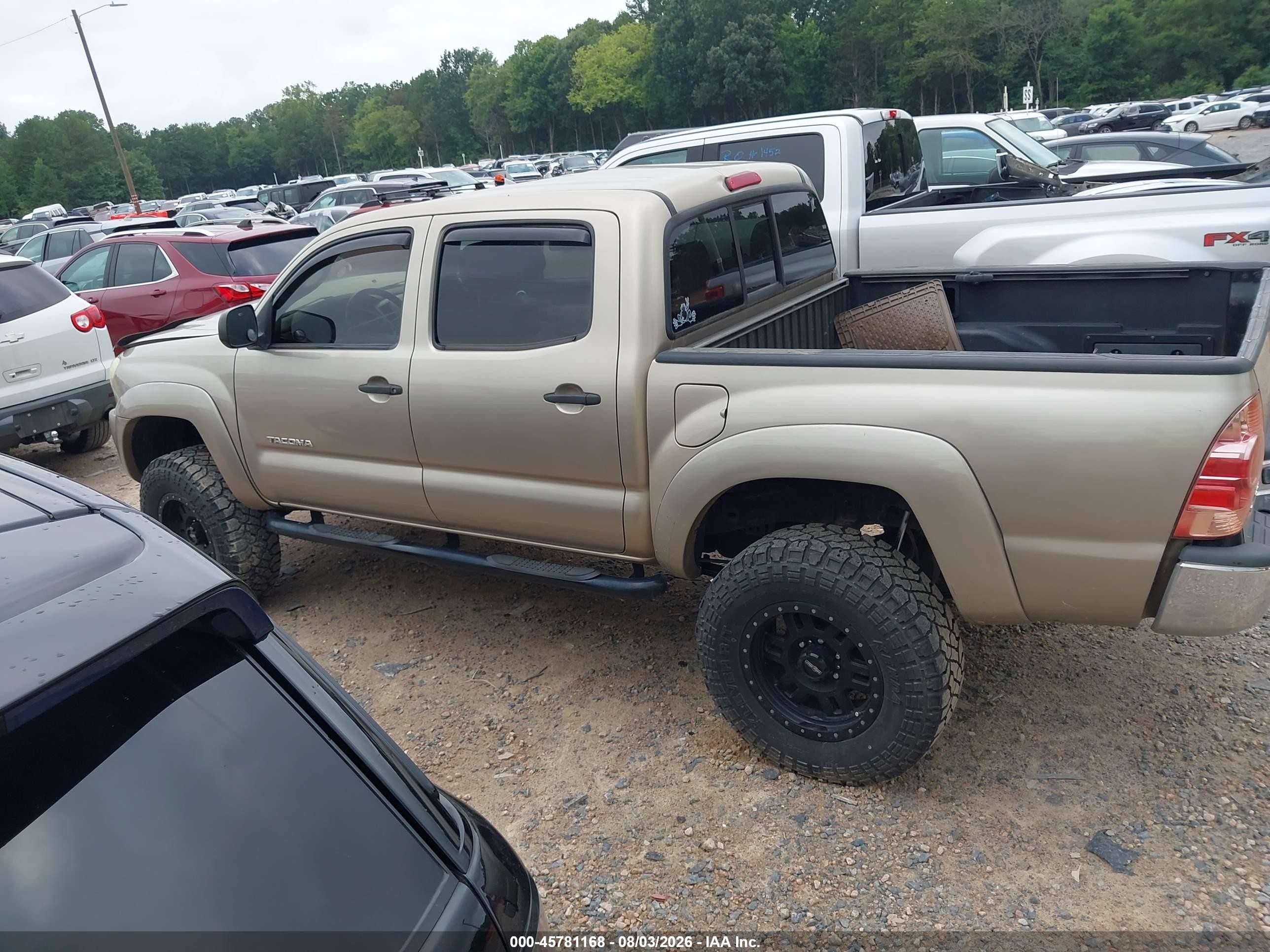 2005 Toyota Tacoma Base V6 Золотой vin: 3TMLU42N95M002786