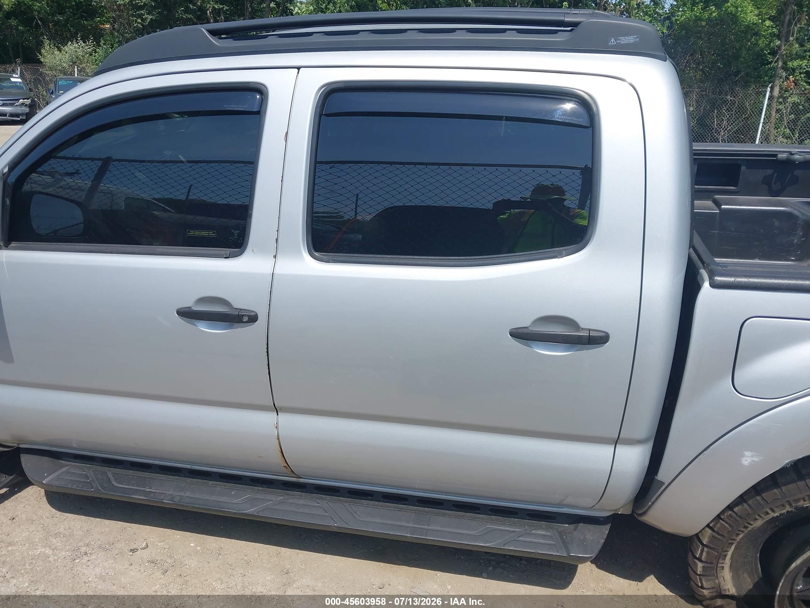 2009 Toyota Tacoma Base V6 Silver vin: 3TMLU42N99M020310