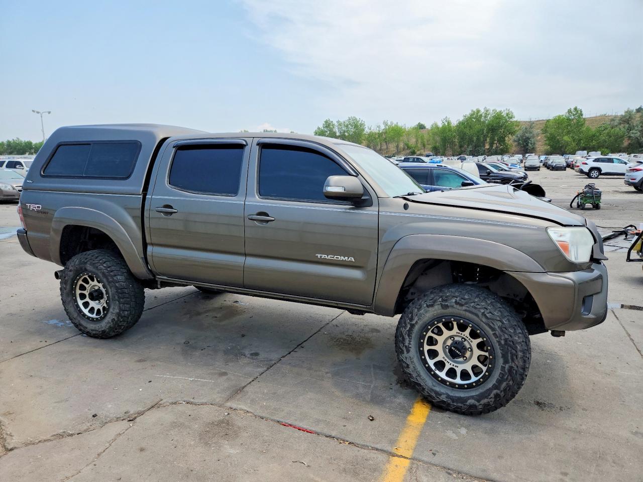 2013 Toyota Tacoma Double Cab Коричневый vin: 3TMLU4EN3DM133027