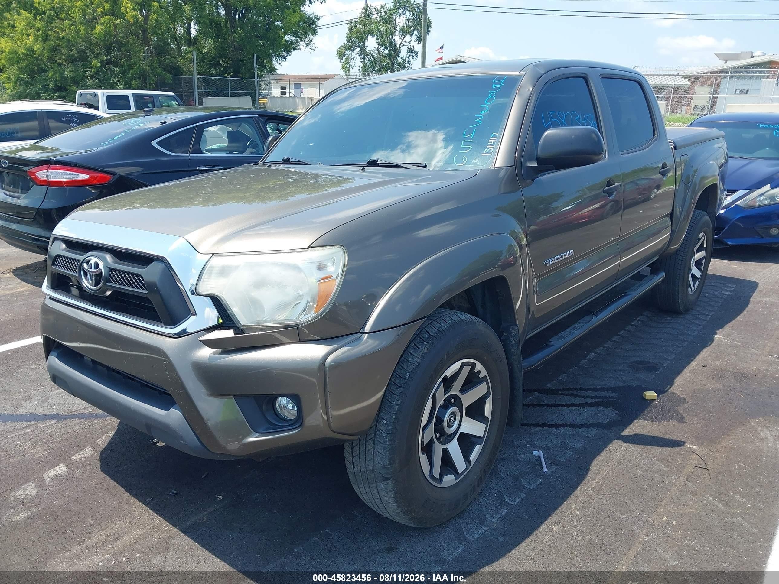 2013 Toyota Tacoma Base V6 Gold vin: 3TMLU4EN6DM131417