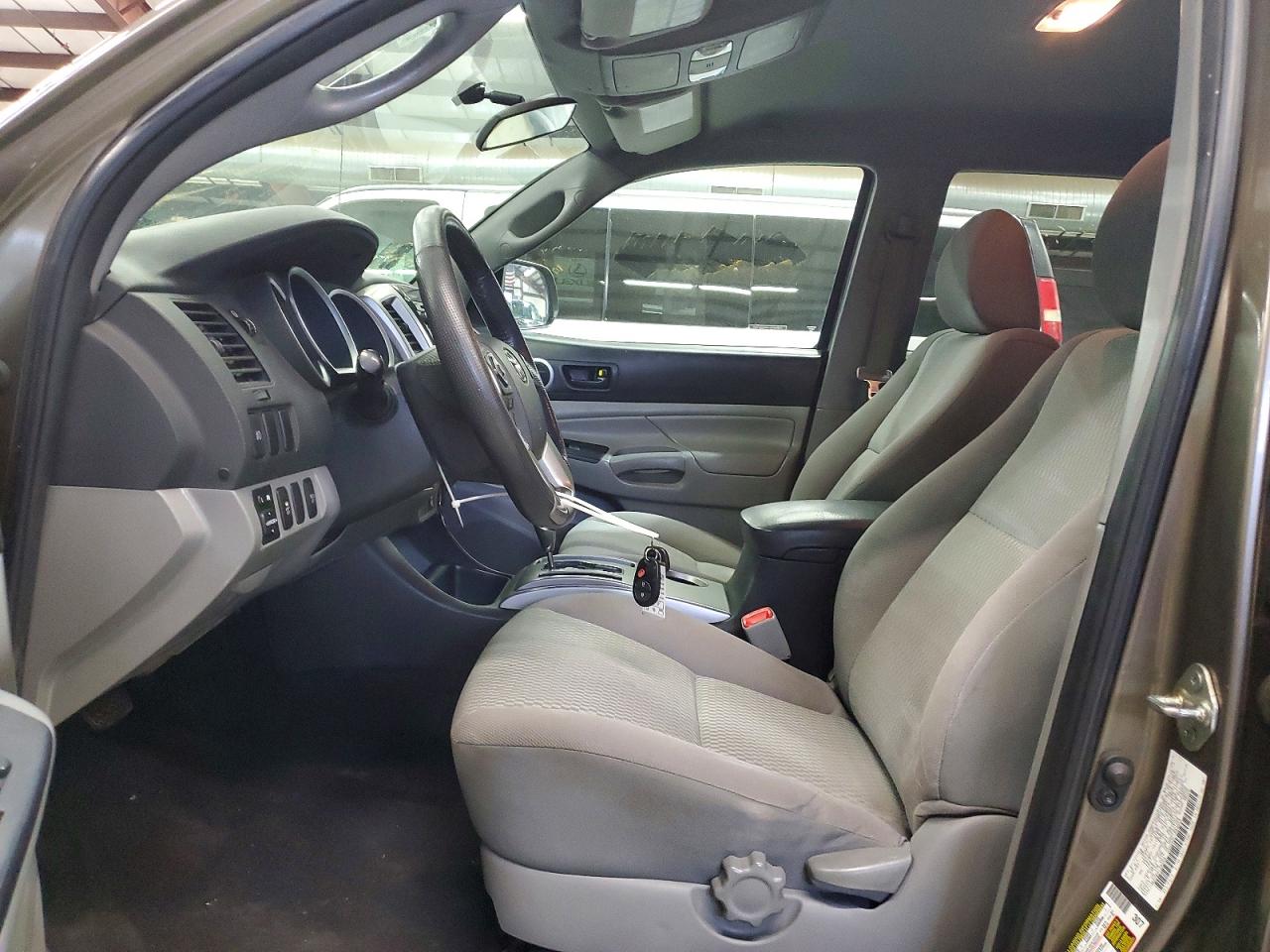 2014 Toyota Tacoma Double Cab Коричневый vin: 3TMLU4EN7EM138264