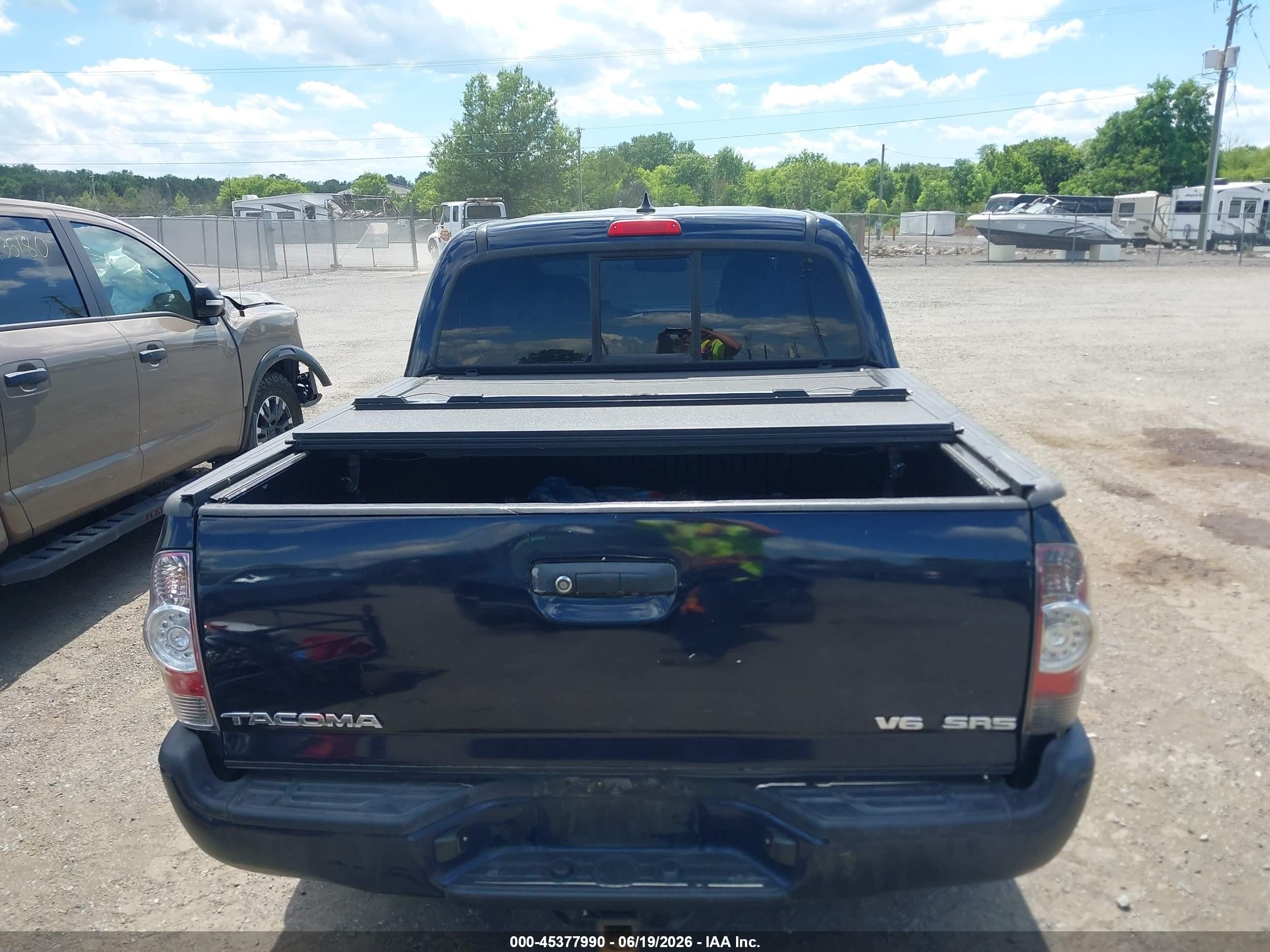 2012 Toyota Tacoma Base V6 Dark Blue vin: 3TMLU4ENXCM095102
