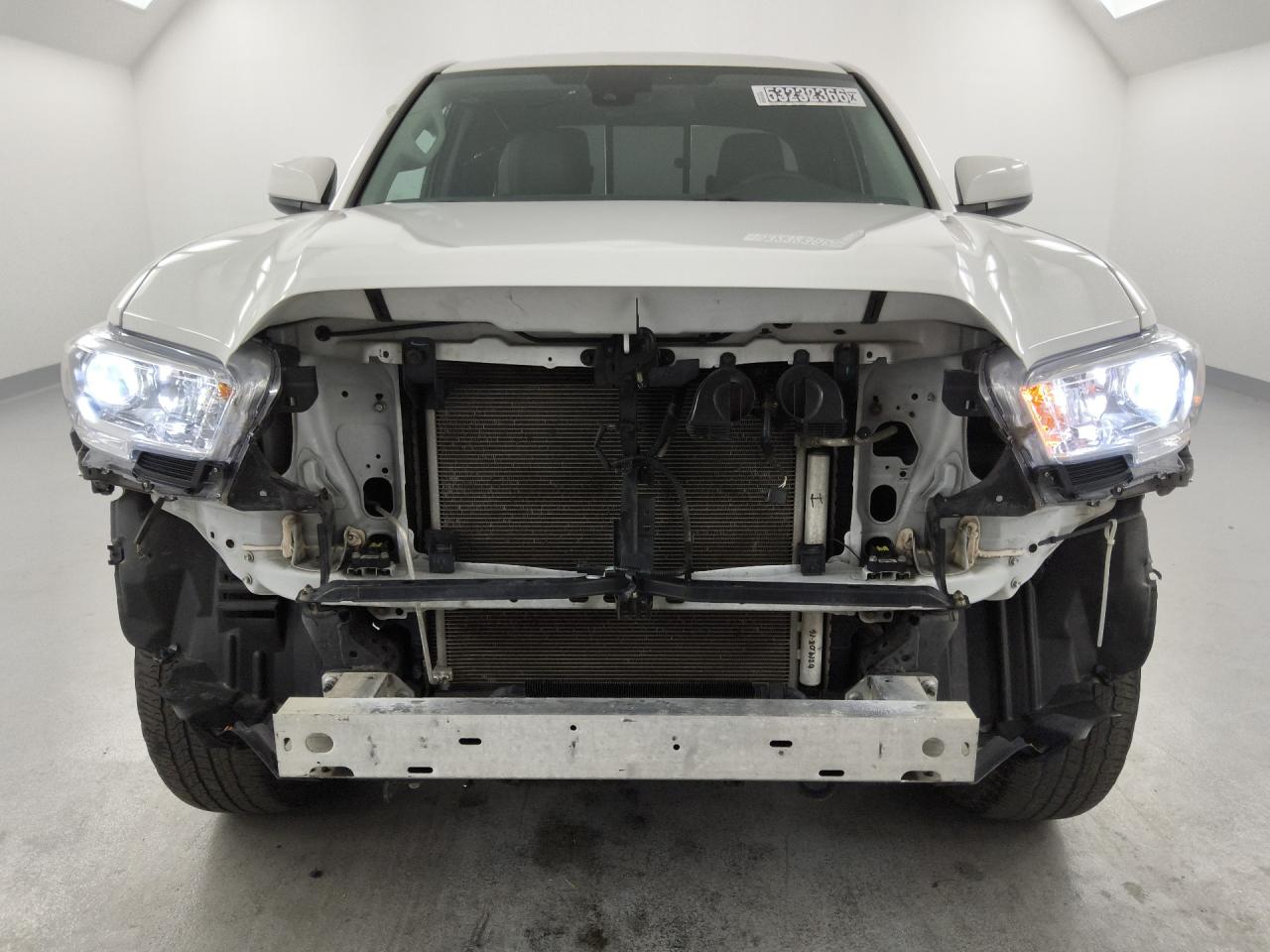 2023 Toyota Tacoma Sr V6 Белый vin: 3TYRZ5CN8PT024723 Damage: Front Bumper Molding, Missing, Replacement Required