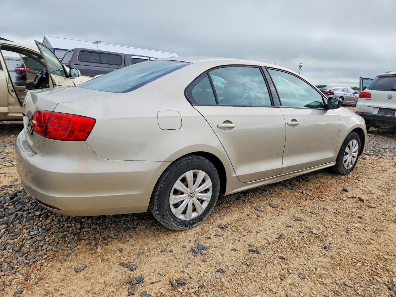 2014 Volkswagen Jetta Base Tan vin: 3VW2K7AJ0EM316695