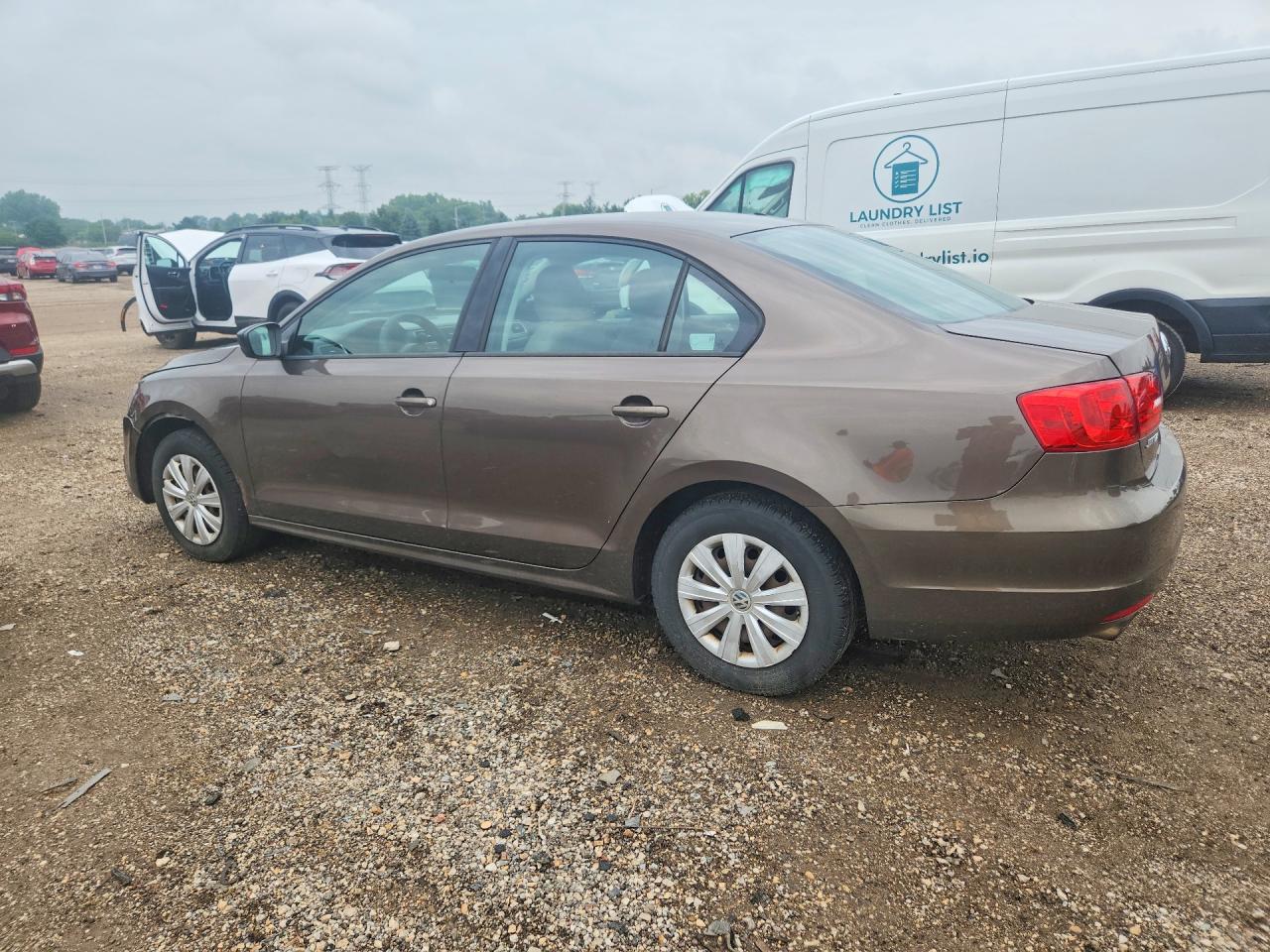 2013 Volkswagen Jetta Base Tan vin: 3VW2K7AJ9DM393144