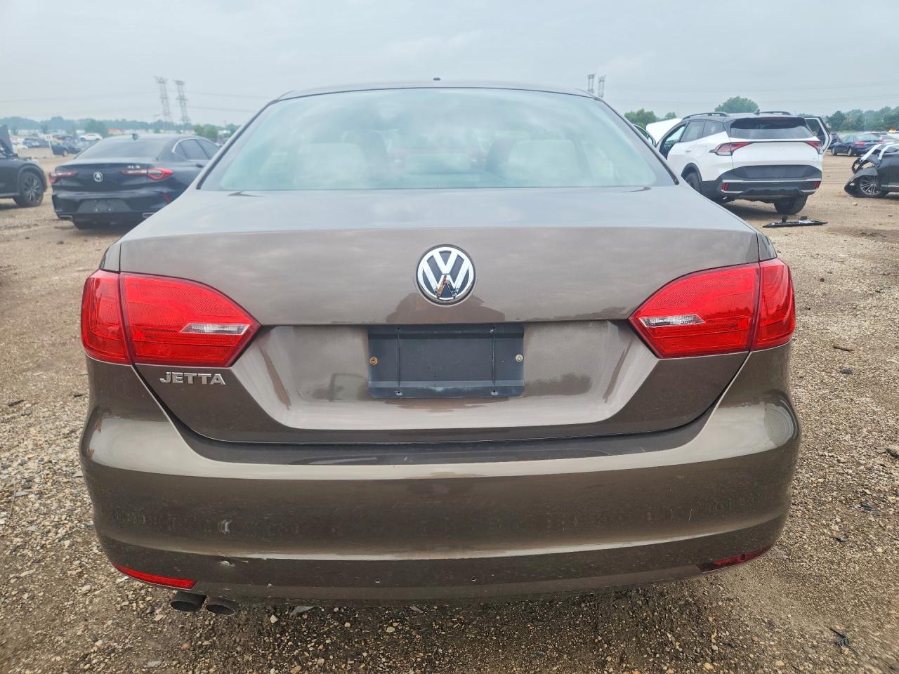 2013 Volkswagen Jetta Base Tan vin: 3VW2K7AJ9DM393144