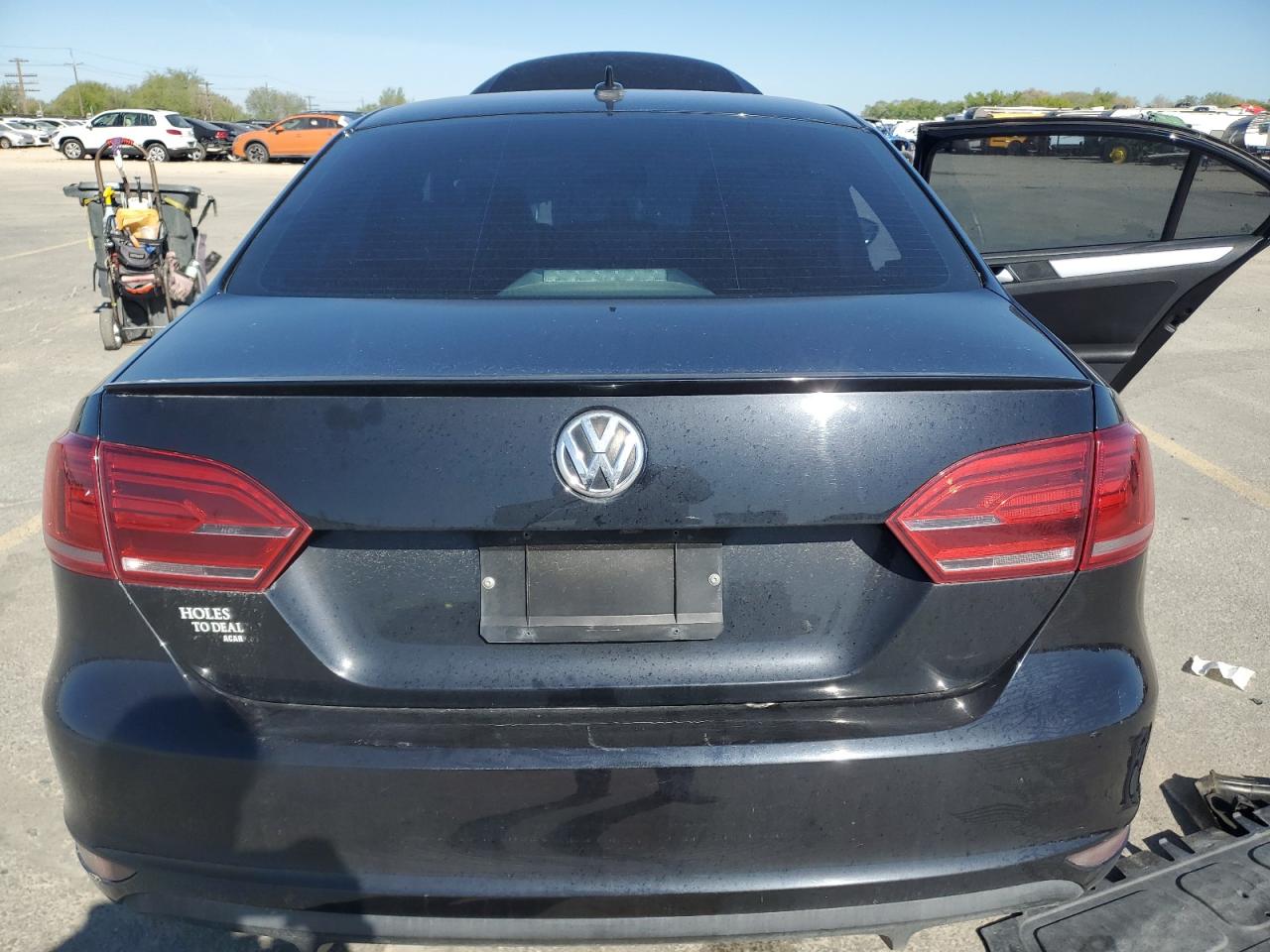 2014 Volkswagen Jetta Gli Black vin: 3VW4S7AJXEM214068 Damage: Rear Bumper, Light Scratch, 3 To 4 Inches