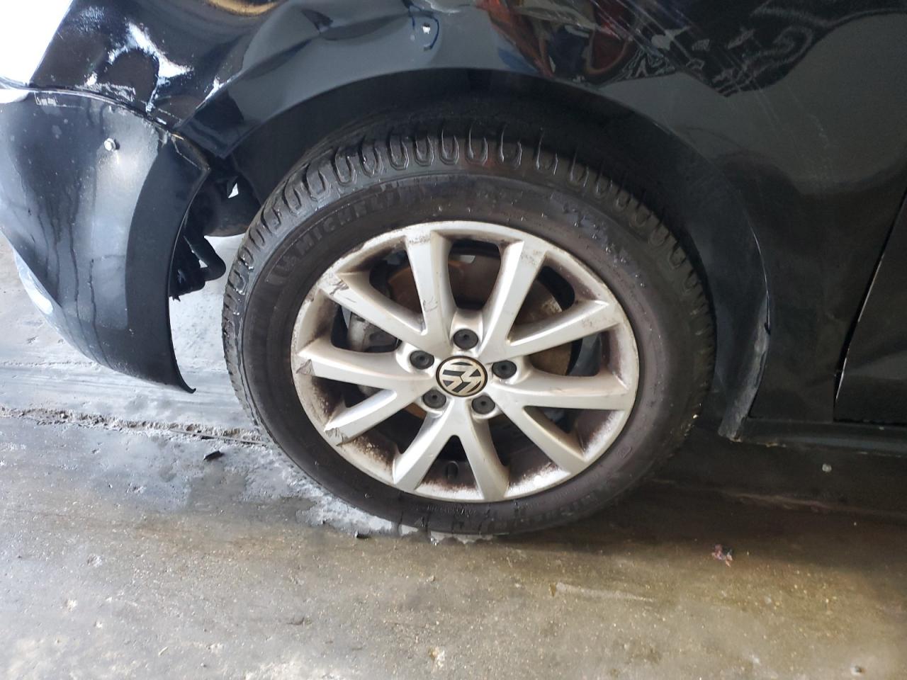 2014 Volkswagen Jetta Se Black vin: 3VWD17AJ9EM425927 Damage: Left Front Wheel, Curb Rash, 11 To 12 Inches