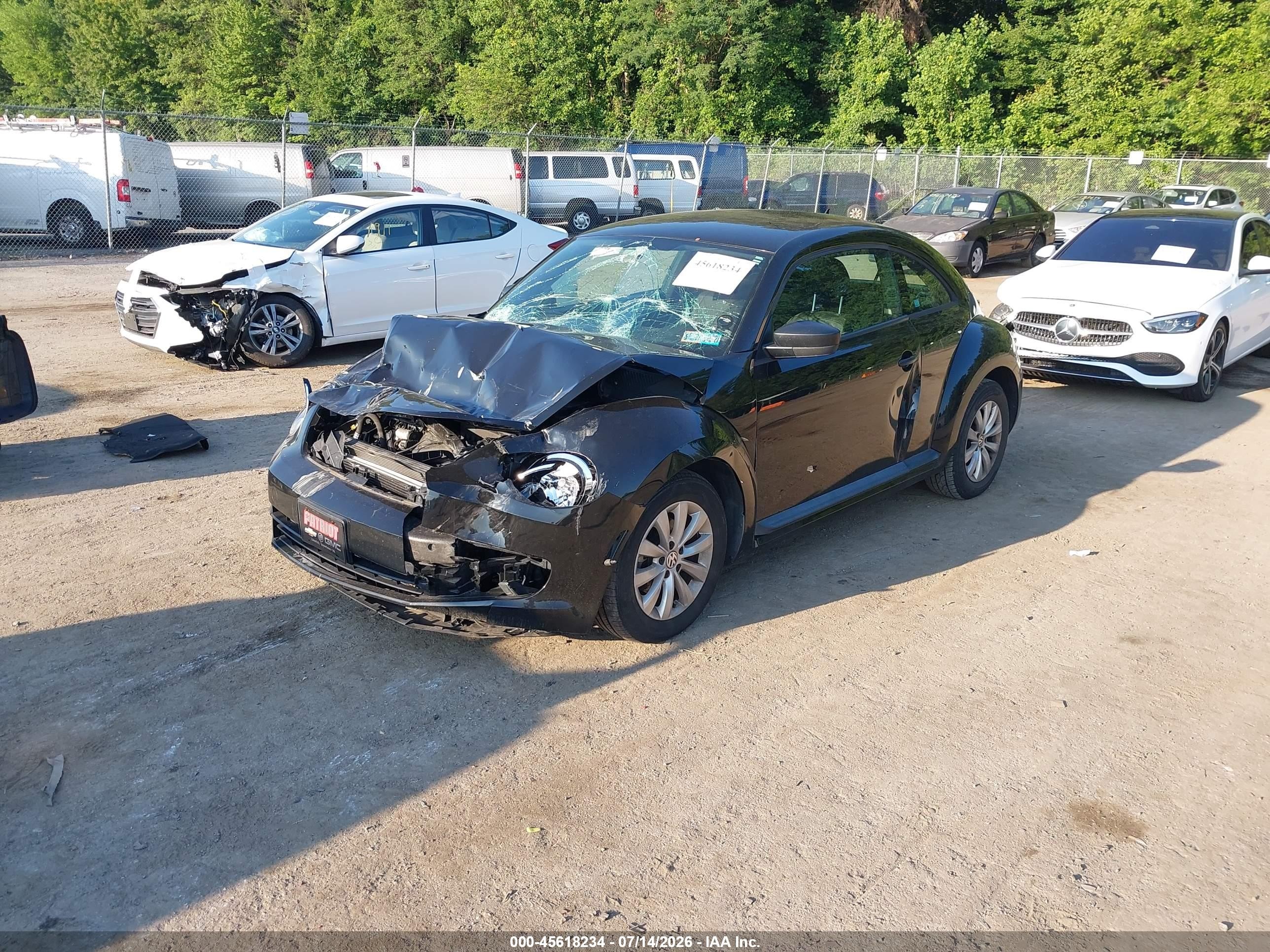 2014 Volkswagen Beetle 1.8t Entry Черный vin: 3VWF17ATXEM652912