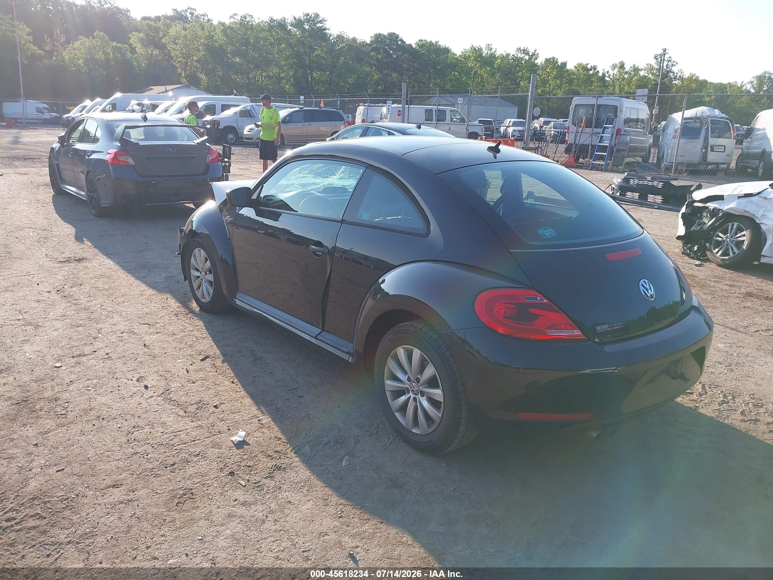 2014 Volkswagen Beetle 1.8t Entry Черный vin: 3VWF17ATXEM652912