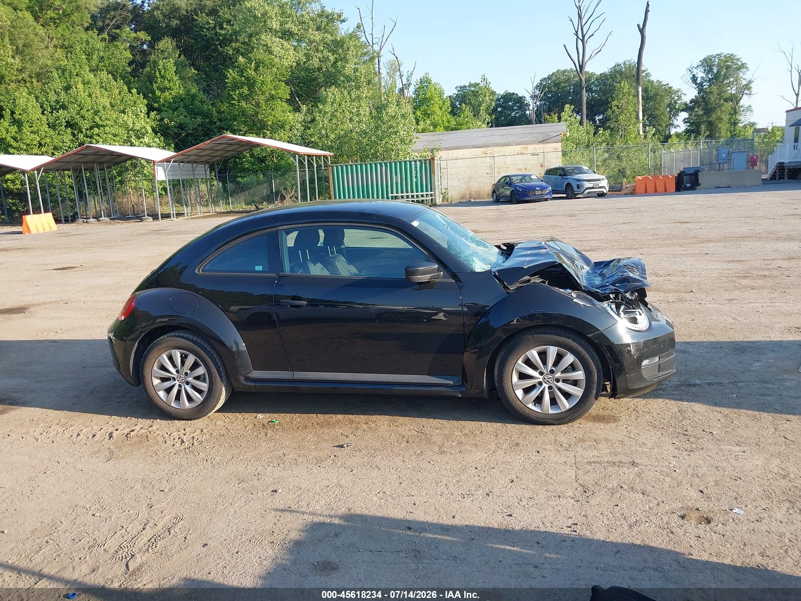 2014 Volkswagen Beetle 1.8t Entry Черный vin: 3VWF17ATXEM652912