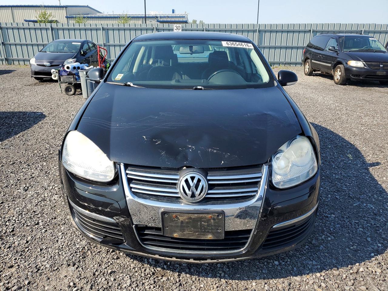 2009 Volkswagen Jetta 2.5 Черный vin: 3VWHM71K29M147928