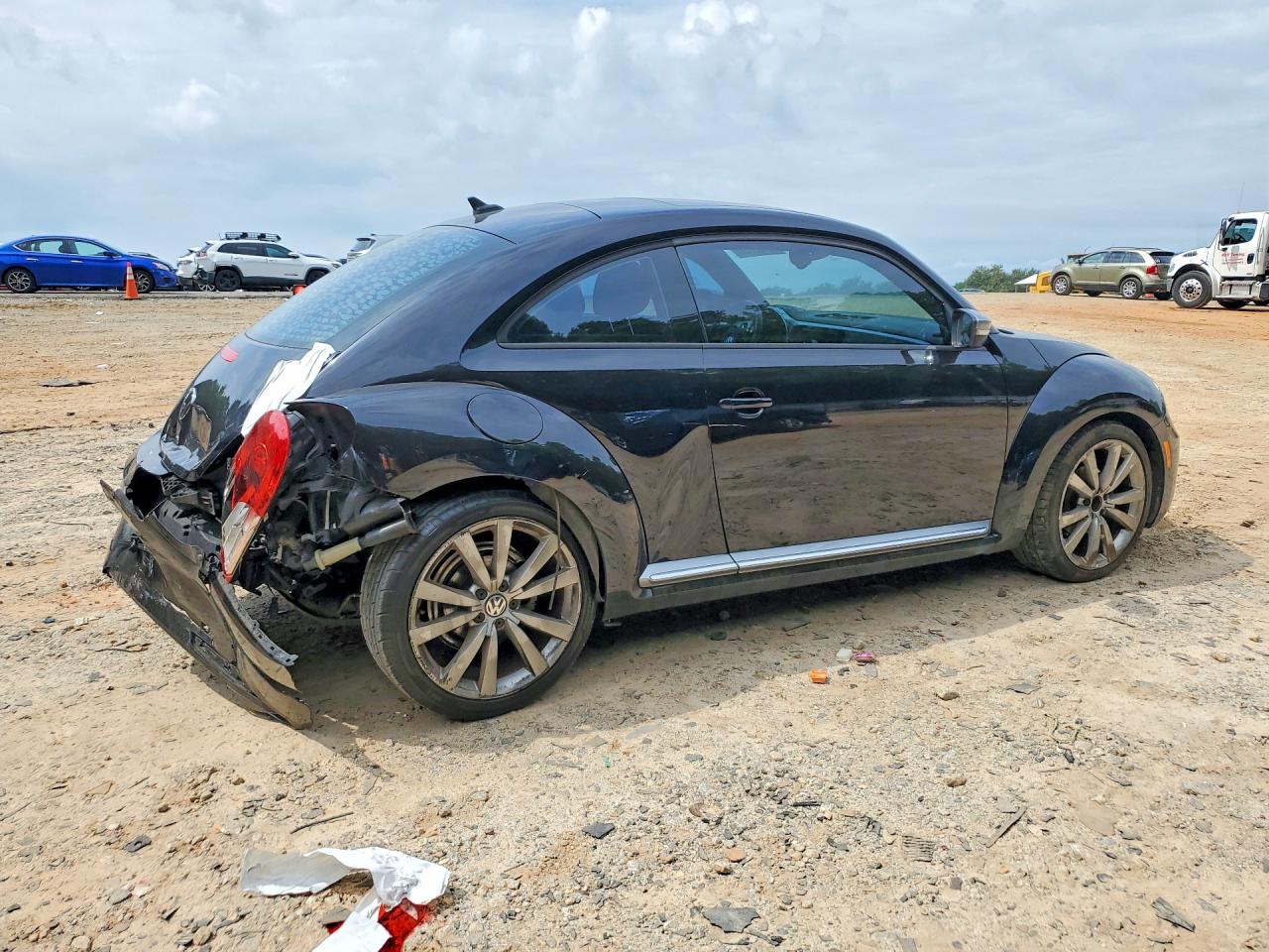 2014 Volkswagen Beetle Black vin: 3VWJ17AT3EM652177