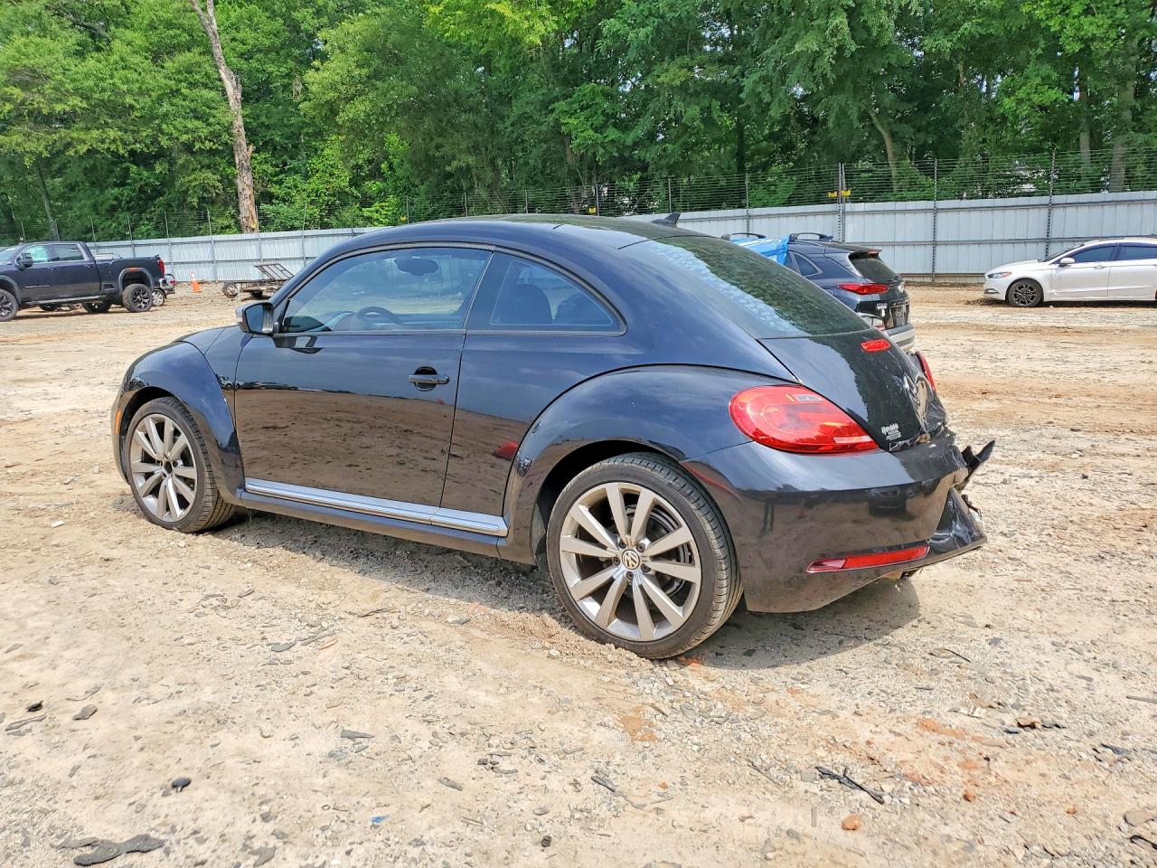 2014 Volkswagen Beetle Black vin: 3VWJ17AT3EM652177