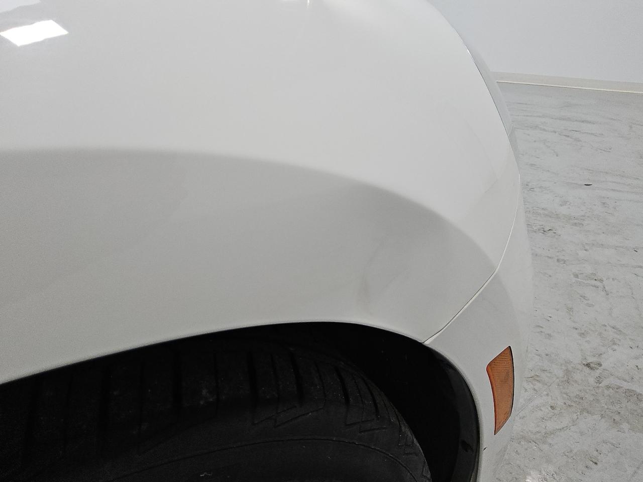 2014 Volkswagen Beetle White vin: 3VWJP7AT1EM623307 Damage: Right Front Fender, Dent(S) W/No Paint Dmg, Pdr-1 Dent