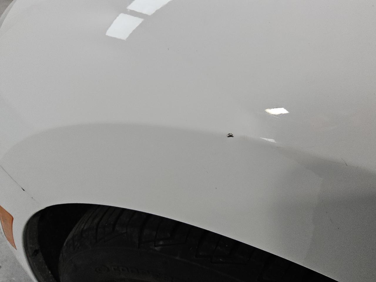 2014 Volkswagen Beetle White vin: 3VWJP7AT1EM623307 Damage: Left Front Fender, Dent(S) W/ Paint Dmg, 1/2 To 1 Inch