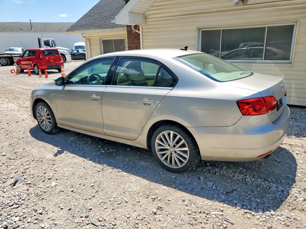 2014 Volkswagen Jetta Sel Желто-коричневый vin: 3VWL07AJ6EM292820