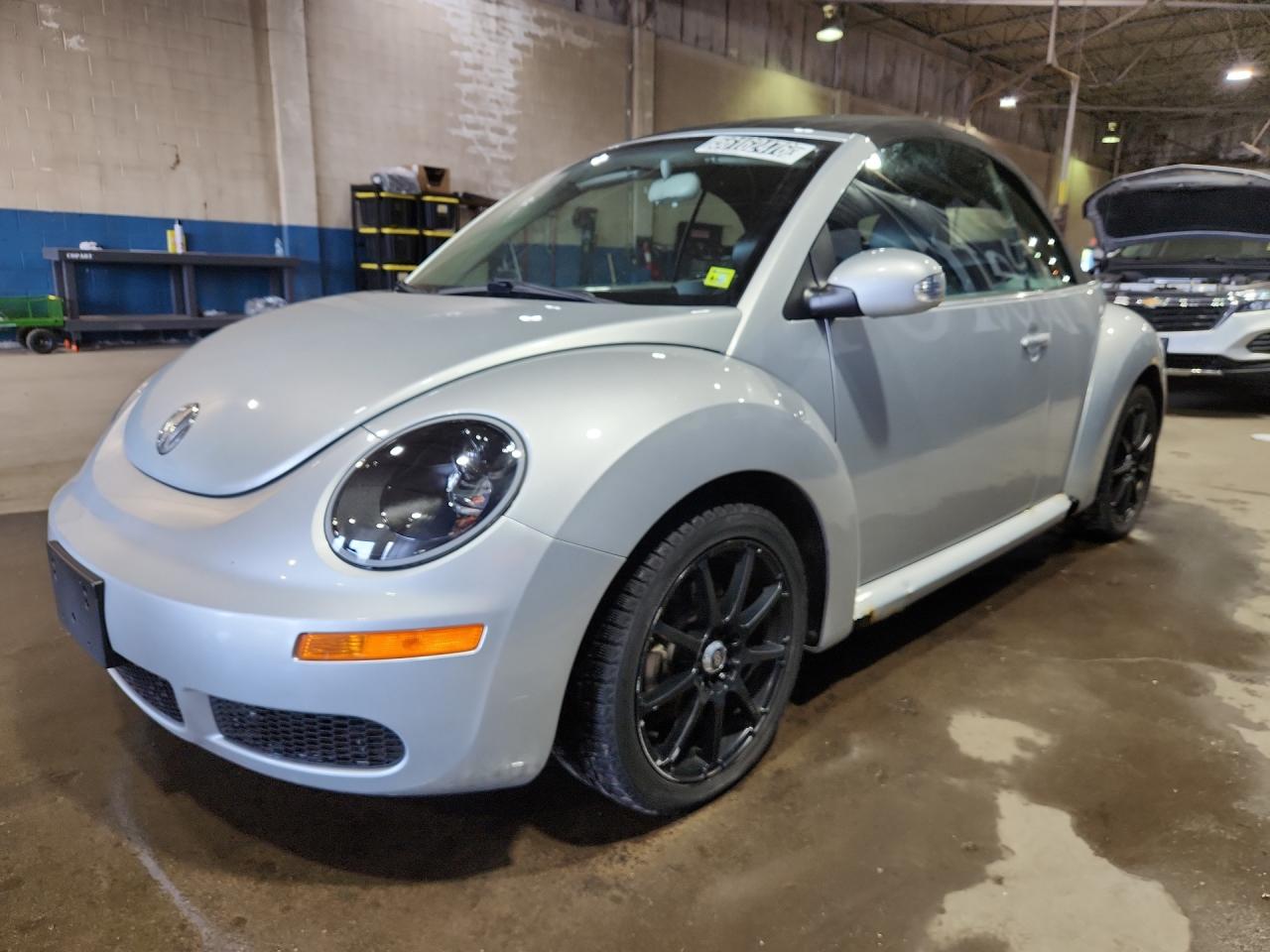2007 Volkswagen New Beetle Convertible Option Package 1 Silver vin: 3VWRF31Y77M412299 Damage: Left Front Wheel, Aftermarket, Acceptable