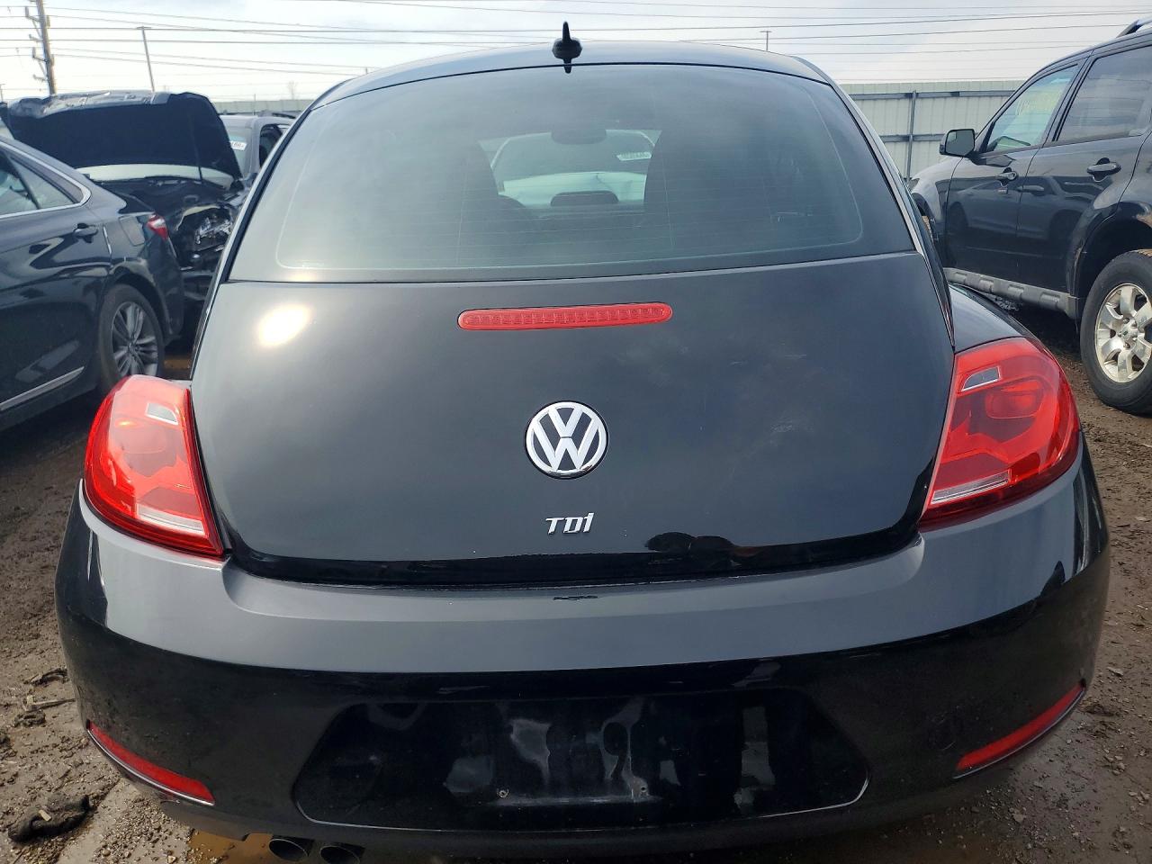 2013 Volkswagen Beetle Black vin: 3VWRL7AT1DM607914