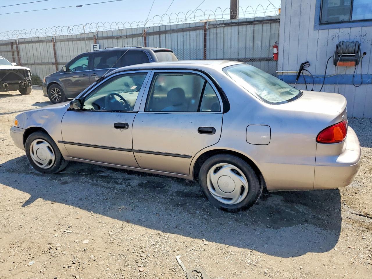 1998 Toyota Corolla Ve Tan vin: 1NXBR12EXWZ117823